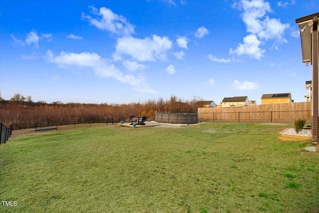 301 Stonebridge Dr, Pikeville, NC 27863 - view of yard with a fenced backyard and a fenced in pool