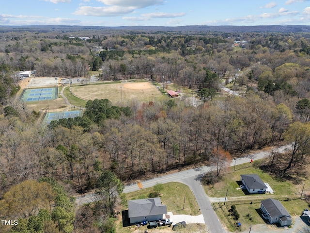 bird's eye view with a view of trees