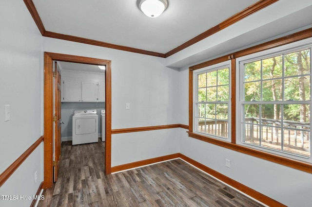 empty room featuring ornamental molding, dark wood-type flooring, visible vents, and baseboards