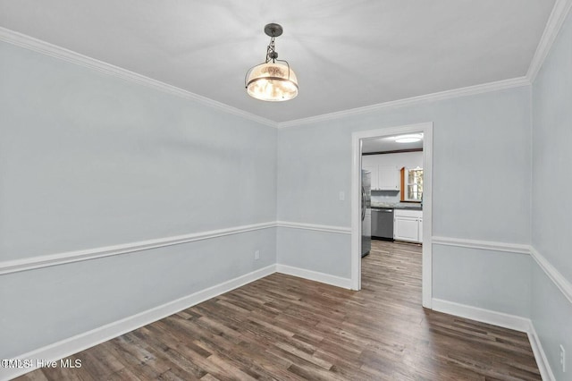 unfurnished room with dark wood-style floors, ornamental molding, and baseboards