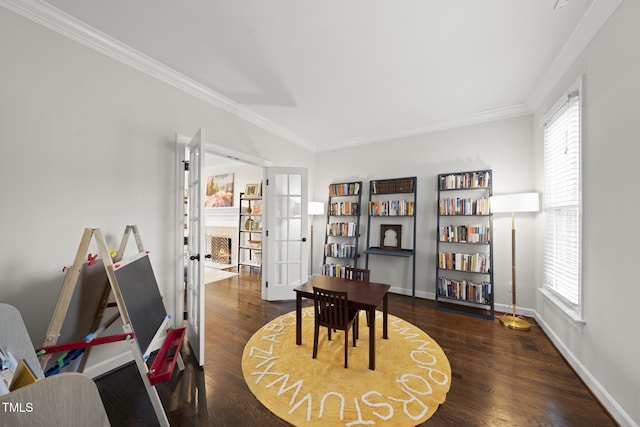 office featuring baseboards, french doors, wood finished floors, and crown molding