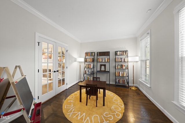 home office featuring baseboards, ornamental molding, wood finished floors, and french doors