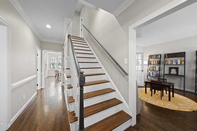 stairs featuring crown molding, baseboards, wood finished floors, and recessed lighting