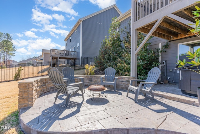 view of patio featuring fence