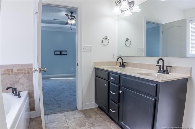 bathroom featuring tile patterned flooring, a sink, a ceiling fan, a bath, and double vanity