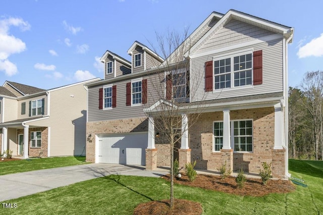 craftsman inspired home featuring a garage, concrete driveway, brick siding, and a front lawn