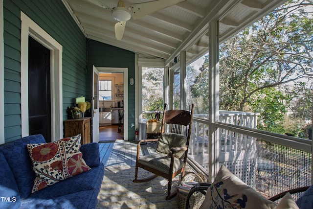 sunroom with lofted ceiling