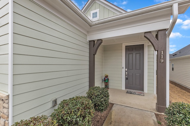 doorway to property with board and batten siding