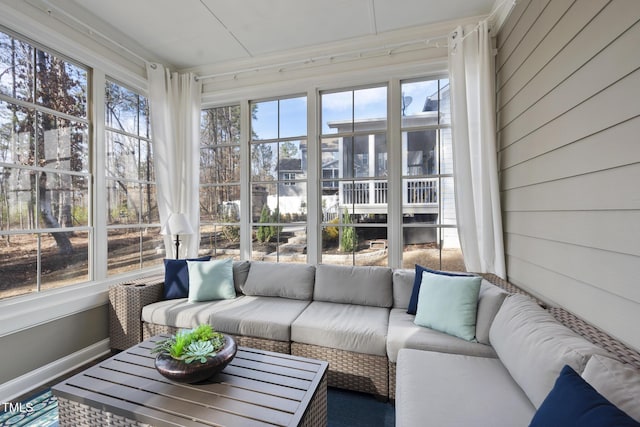 sunroom featuring a healthy amount of sunlight