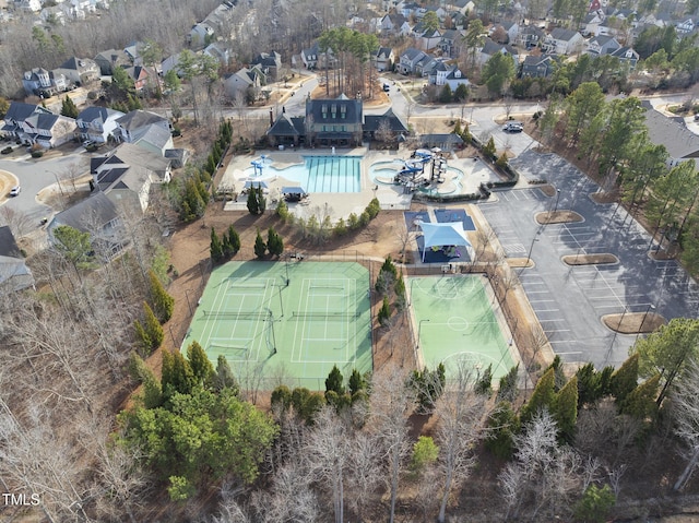 birds eye view of property with a residential view