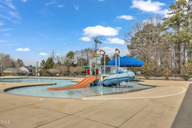 community play area featuring fence