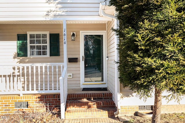 view of exterior entry with crawl space