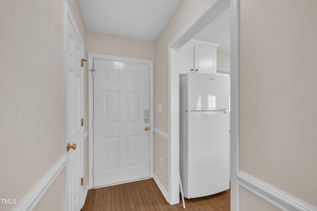 1614 W Cotton Gin Dr, Clayton, NC 27527 - doorway to outside featuring wood finished floors