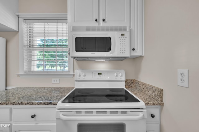 1614 W Cotton Gin Dr, Clayton, NC 27527 - kitchen featuring white appliances, white cabinets, and light stone counters