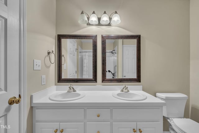 1614 W Cotton Gin Dr, Clayton, NC 27527 - full bathroom featuring double vanity and toilet