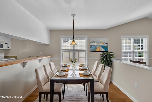 1614 W Cotton Gin Dr, Clayton, NC 27527 - dining room featuring wood finished floors and baseboards