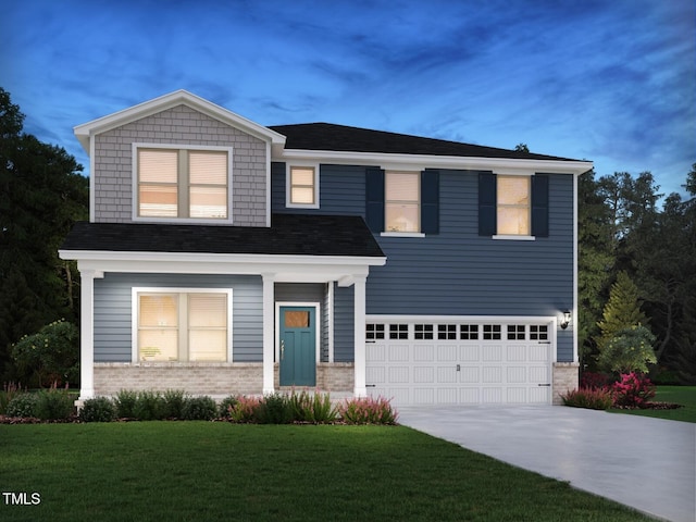 view of front of property with driveway, brick siding, an attached garage, and a front yard