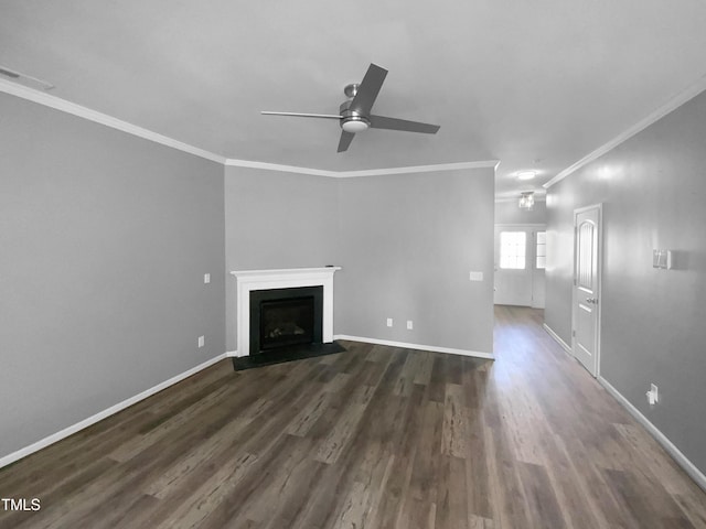 unfurnished living room featuring a fireplace with flush hearth, visible vents, baseboards, dark wood finished floors, and crown molding