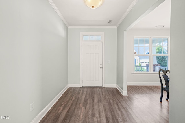 4508 Brintons Cottage St, Raleigh, NC 27616 - foyer with dark wood finished floors, baseboards, and crown molding