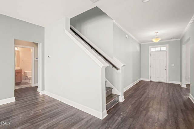 4508 Brintons Cottage St, Raleigh, NC 27616 - entryway with dark wood-style floors, stairway, baseboards, and ornamental molding