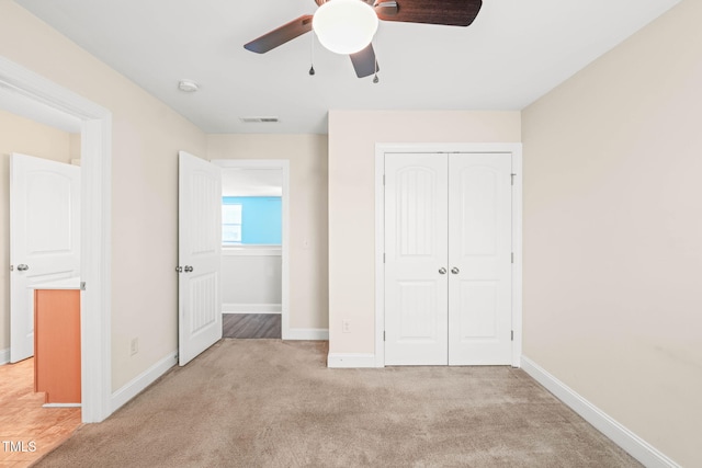 4508 Brintons Cottage St, Raleigh, NC 27616 - unfurnished bedroom featuring a closet, baseboards, light colored carpet, and ceiling fan