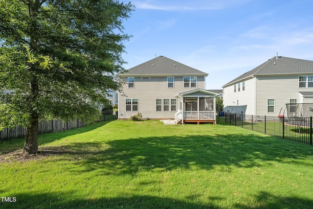 4508 Brintons Cottage St, Raleigh, NC 27616 - rear view of house with a sunroom