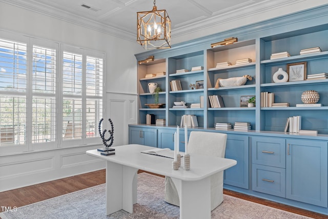 office featuring crown molding, visible vents, light wood-style flooring, an inviting chandelier, and wainscoting