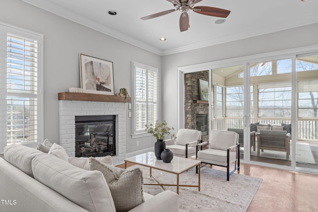 living room with ceiling fan, recessed lighting, a fireplace, wood finished floors, and ornamental molding