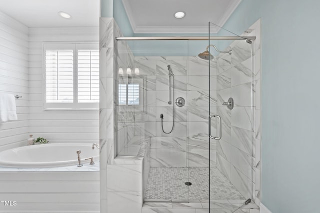 full bath with ornamental molding, a shower stall, and a bath