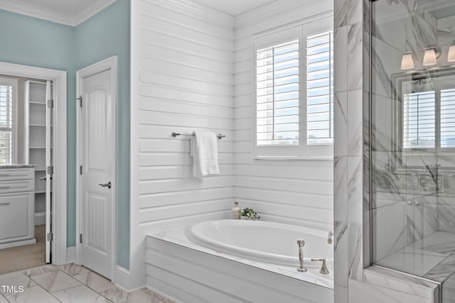 bathroom with marble finish floor, ornamental molding, a marble finish shower, and a bath