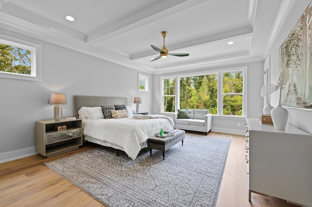 bedroom with beam ceiling, crown molding, recessed lighting, light wood-type flooring, and baseboards