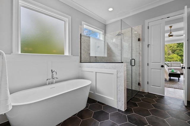 bathroom with recessed lighting, a soaking tub, a shower stall, and tile patterned floors