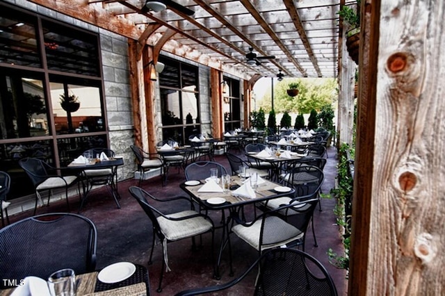 view of patio / terrace featuring outdoor dining space and a pergola