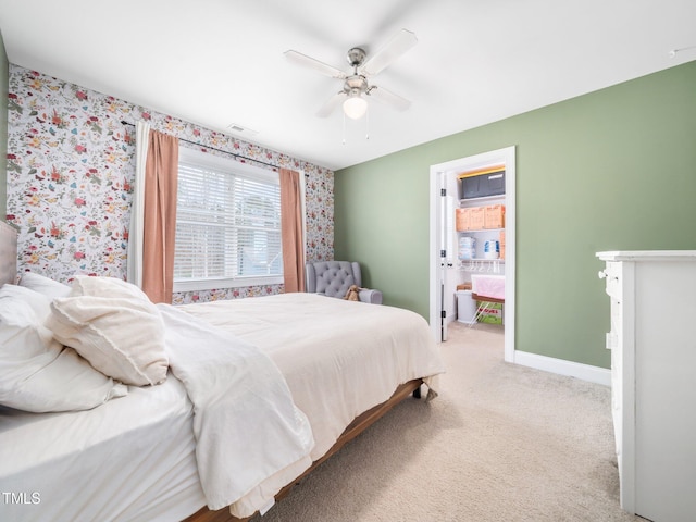 carpeted bedroom with wallpapered walls, a ceiling fan, visible vents, and baseboards