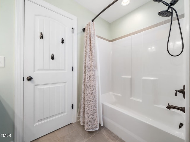 full bath with tile patterned flooring and shower / bathtub combination with curtain