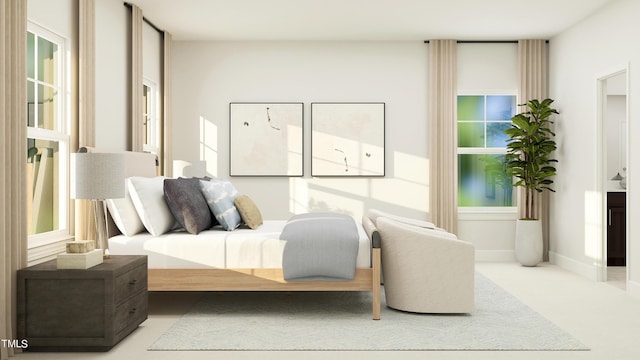 bedroom featuring light carpet and baseboards