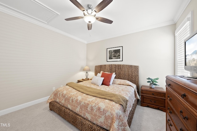 carpeted bedroom featuring attic access, ornamental molding, ceiling fan, and baseboards