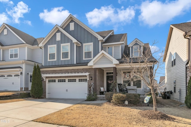 view of front of property featuring concrete driveway, an attached garage, a porch, board and batten siding, and brick siding