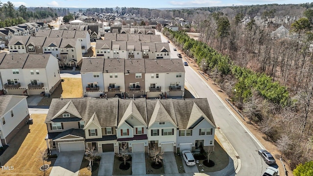 birds eye view of property with a residential view