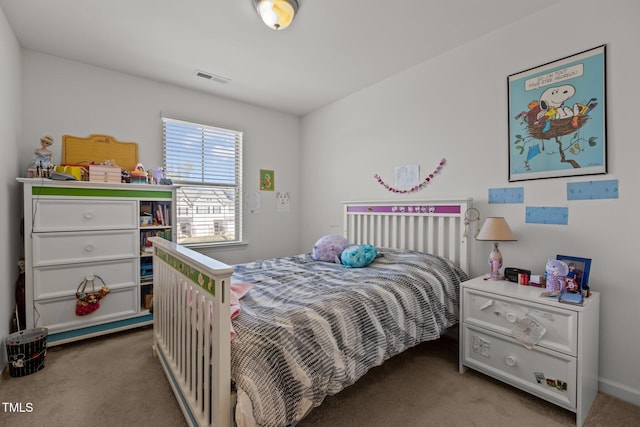 carpeted bedroom with visible vents