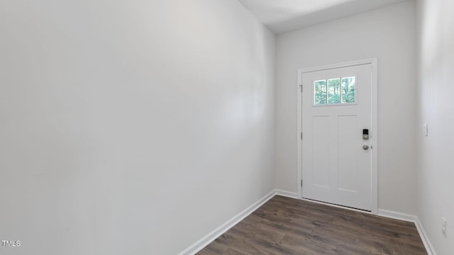 foyer entrance with baseboards and dark wood finished floors