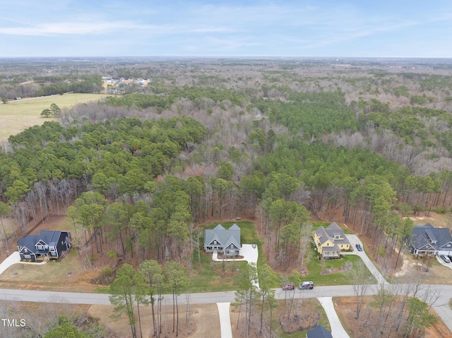 bird's eye view with a view of trees