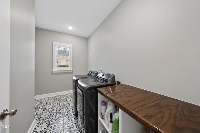 laundry room featuring tile patterned flooring, baseboards, washing machine and dryer, laundry area, and recessed lighting