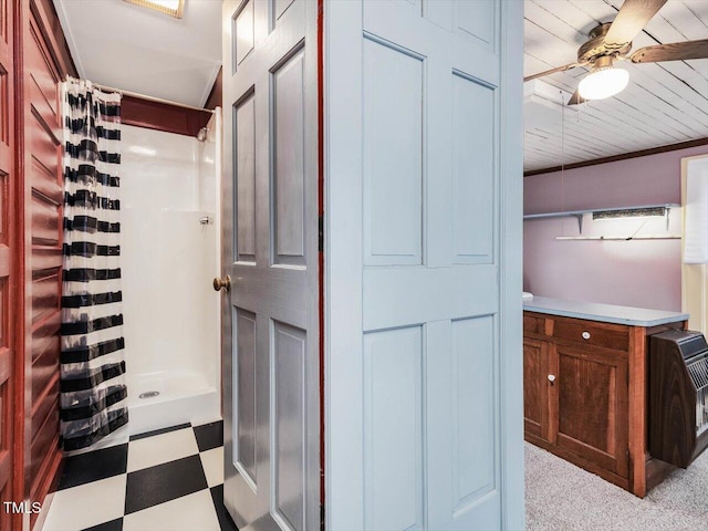 interior space with ornamental molding, heating unit, and light floors