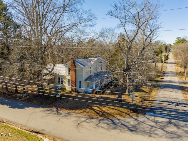 view of front of property featuring a chimney