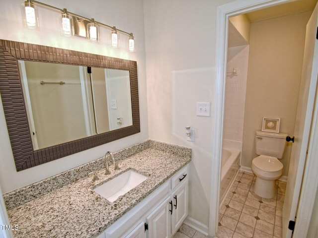 bathroom with toilet, tile patterned flooring, baseboards, bathing tub / shower combination, and vanity