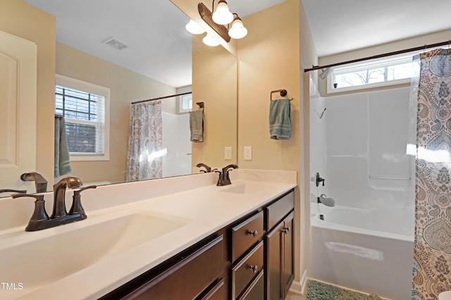 full bath featuring shower / tub combo with curtain, visible vents, a sink, and double vanity