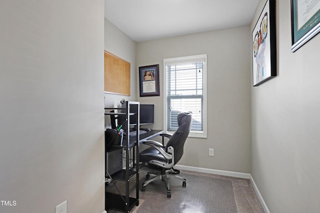 office area featuring baseboards