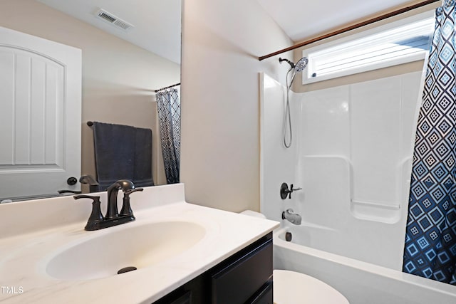 bathroom featuring shower / bathtub combination with curtain, visible vents, vanity, and toilet