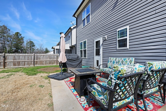 exterior space with a patio and fence